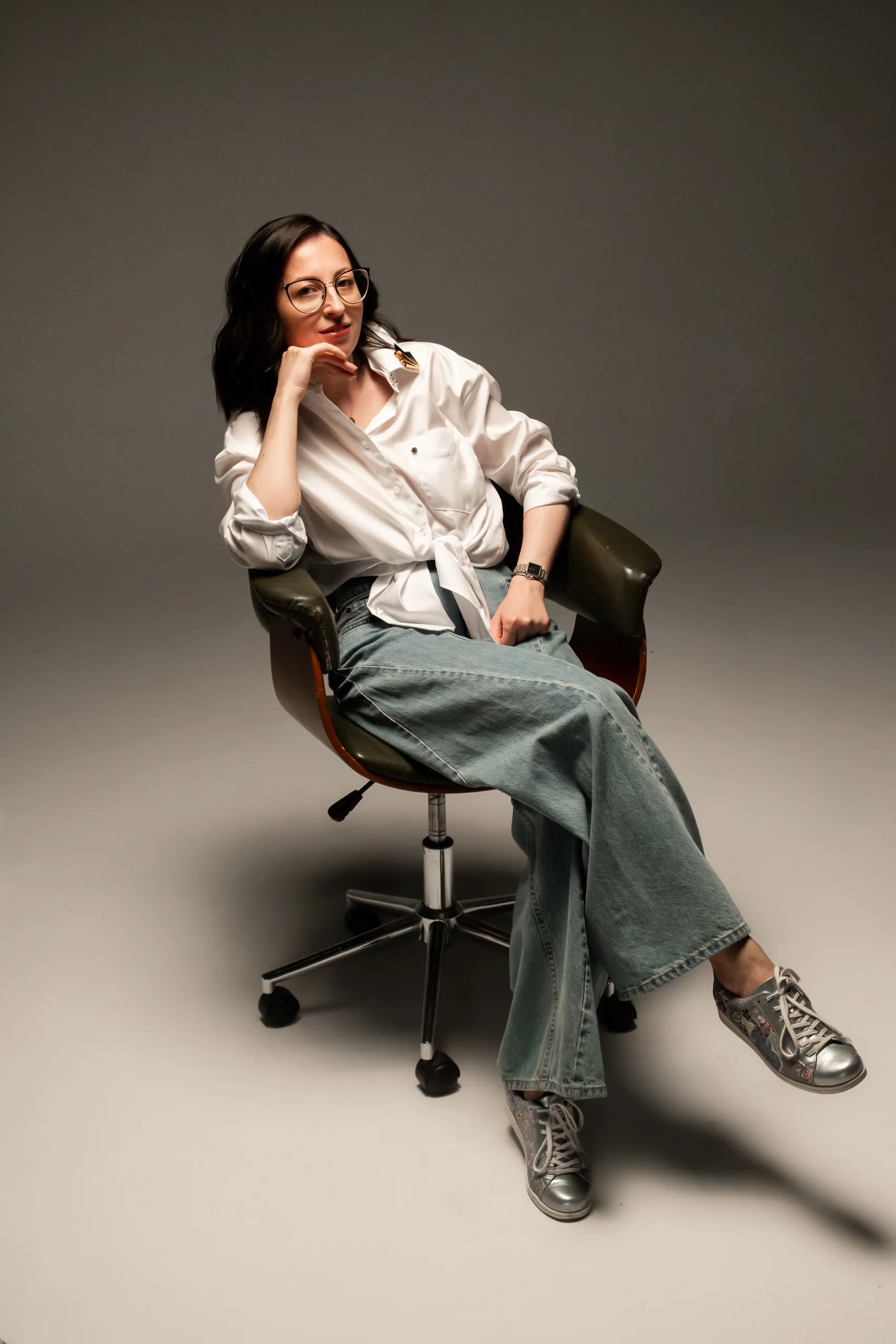 Studio portrait of Libby Tolm, Founder and Technical Director of Elite Knitting, in her Austin, Texas luxury knitwear design studio