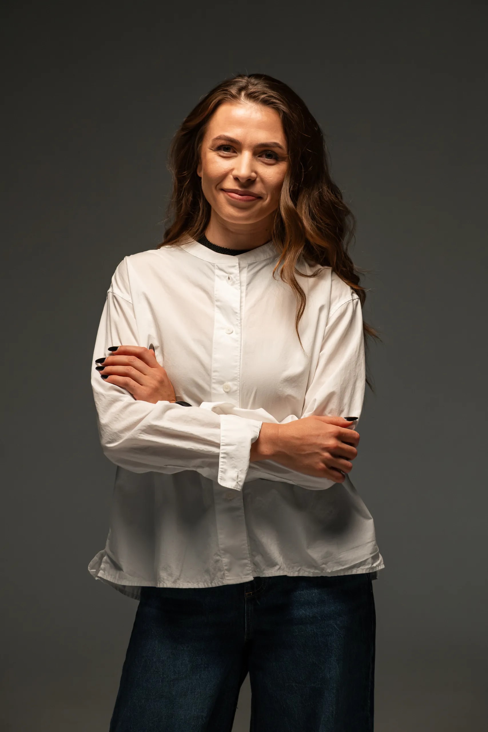 Operational portrait of Olha Sentiabova, Studio Manager and Quality Control Specialist at the Elite Knitting garment manufacturing atelier